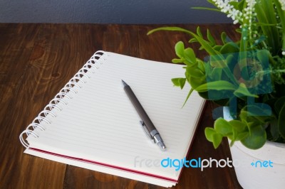 Notebook And Pencil Stock Photo