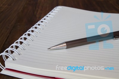 Notebook And Pencil Stock Photo