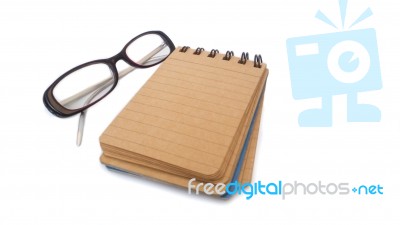 Notebook With Glasses Stock Photo