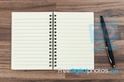 Notebook With Pen Stock Photo