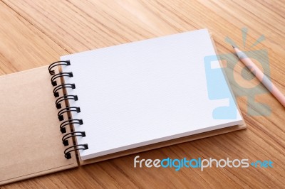 Notebook With Pencil Stock Photo