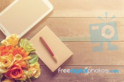 Notebooks And Tablets On A Wooden Stock Photo