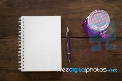 Notepaper, Pen And Drink On Wooden Table Stock Photo