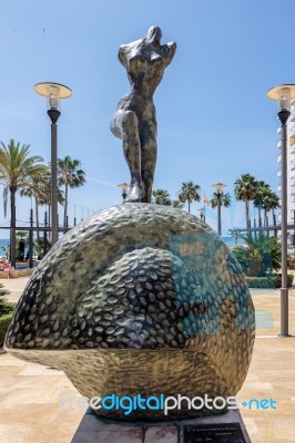 Nude Woman Walking Up Stairs Statue By Salvador Dali In Marbella… Stock Photo