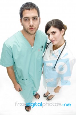 Nurse Standing With Surgeon Stock Photo