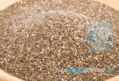 Nutritious Chia Seeds On A Wooden Plate Stock Photo