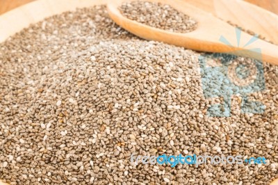 Nutritious Chia Seeds On A Wooden Plate Stock Photo