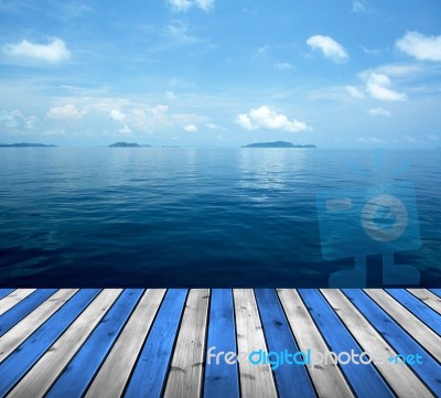 Ocean With Sky And Wood Floor Stock Photo