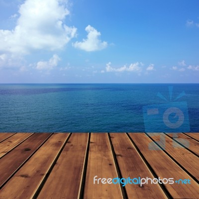 Ocean With Sky And Wood Floor Stock Photo