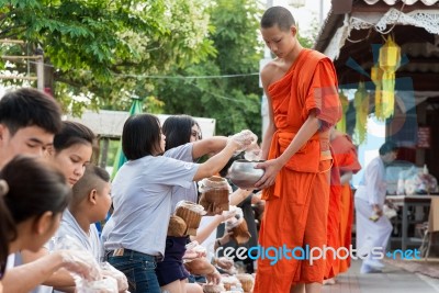 Offer Food To Monk Stock Photo