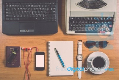 Office Desk With Computer, Supplies, Coffee Cup, Passport, Sungl… Stock Photo