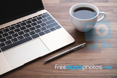 Office Desk With Laptop Stock Photo