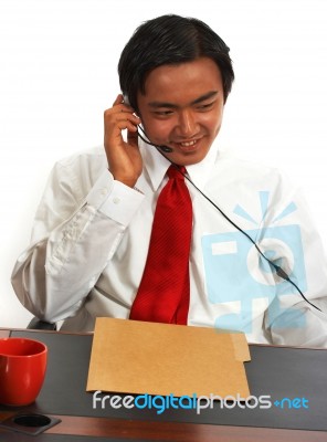 Office Worker Chatting Online Stock Photo