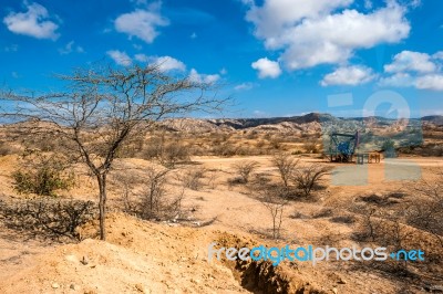 Oil Pump In The Desert, Mancora, Peru Stock Photo