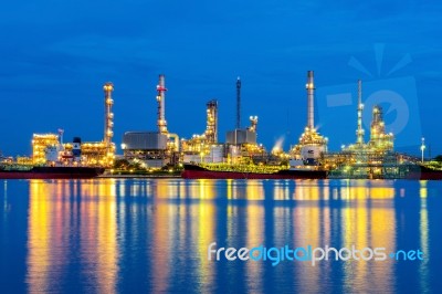 Oil Refinery At Night In Bangkok, Thailand Stock Photo