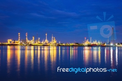 Oil Refinery At Night In Bangkok, Thailand Stock Photo