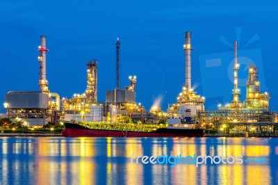 Oil Refinery At Night In Bangkok, Thailand Stock Photo