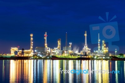 Oil Refinery At Night In Bangkok, Thailand Stock Photo