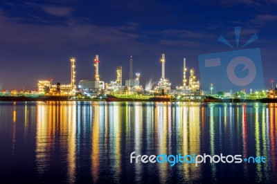 Oil Refinery At Night In Bangkok, Thailand Stock Photo