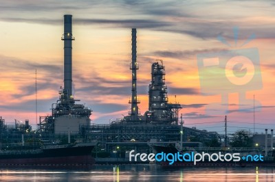 Oil Refinery At Twilight In Bangkok, Thailand Stock Photo