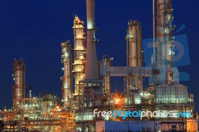 Oil Refinery Plant In Petrochemical Industry Estate At Night Tim… Stock Photo