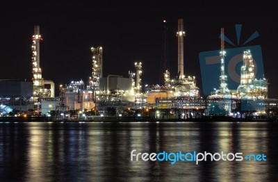 Oil Refinery Plant Night Scene Nearby River Stock Photo