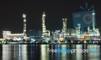 Oil Refinery Plant Night Scene Nearby River Stock Photo