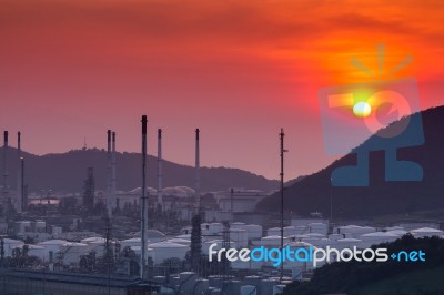 Oil Refinery With Beautiful Sunset Background Stock Photo