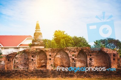 Old Ancient Pagoda In Lopburi Thailand, With Old Exterior Brick Wall Background Vintage Style Grung Texture Stock Photo