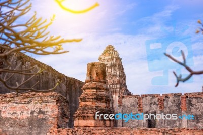 Old Ancient Pagoda In Lopburi Thailand, With Old Exterior Brick Wall Background Vintage Style Grung Texture Stock Photo