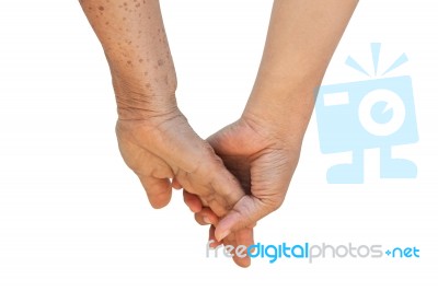 Old And Young Women Holding Hand Stock Photo