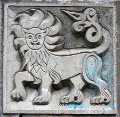 Old Bas-relief Of Fairytale Lion Stock Photo