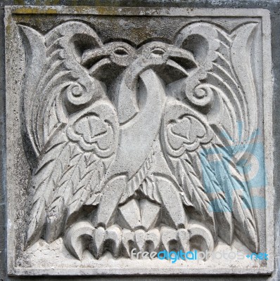 Old Bas-relief Of Fairytale Two Eagles Stock Photo