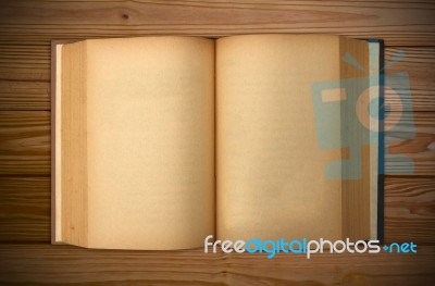 Old Book Open Two Face On Wood Table Stock Photo