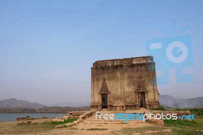 Old Buddha In Ancient Temple Stock Photo