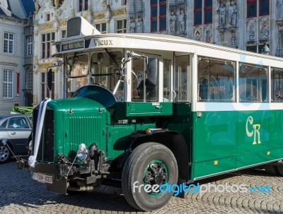 Old Bus In Market Square Bruges Stock Photo