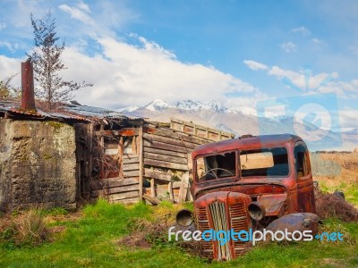 Old Car Behind A Shack Stock Photo