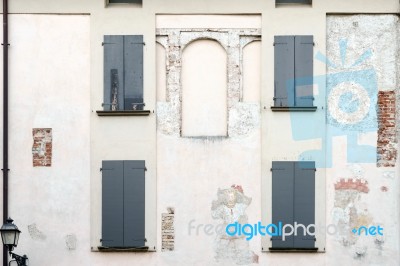 Old Faded Mural On A Wall In Sarnico Stock Photo