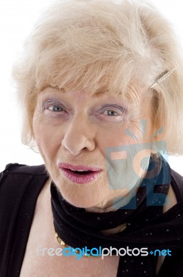 Old Female Looking At Camera Stock Photo