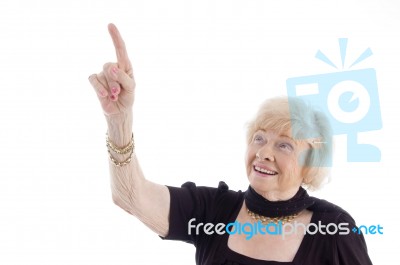 Old Female Pointing Upward Stock Photo