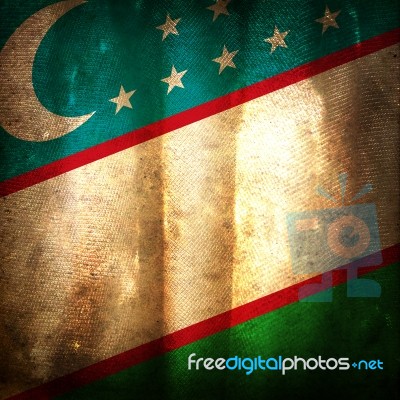 Old Grunge Flag Of Uzbekistan Stock Photo