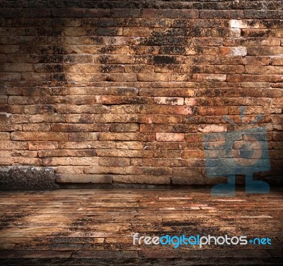 Old Grunge Interior With Brick Wall Stock Photo