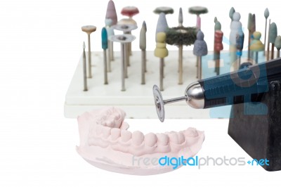 Old Grunge Micromotor Dental Lab And Mould Of Teeth Stock Photo