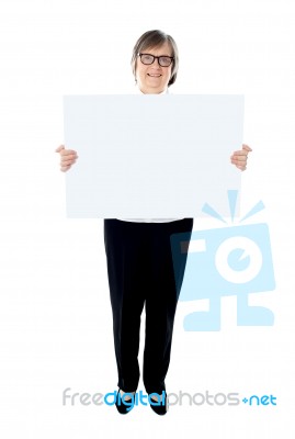 Old Lady Holding Blank Board Stock Photo