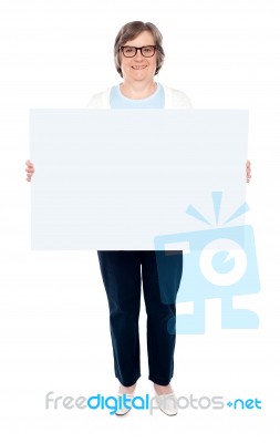 Old Lady Holding Blank White board Stock Photo