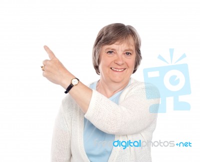 Old Lady Pointing Away Stock Photo