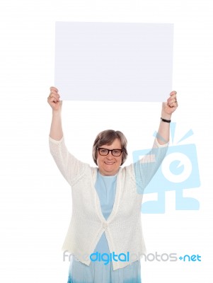 Old lady showing blank board Stock Photo