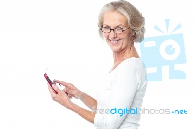Old Lady Using Tablet Pc Device Stock Photo