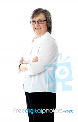 Old Lady With Crossed Arms Stock Photo