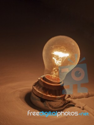 Old Light Bulb On Wall Stock Photo